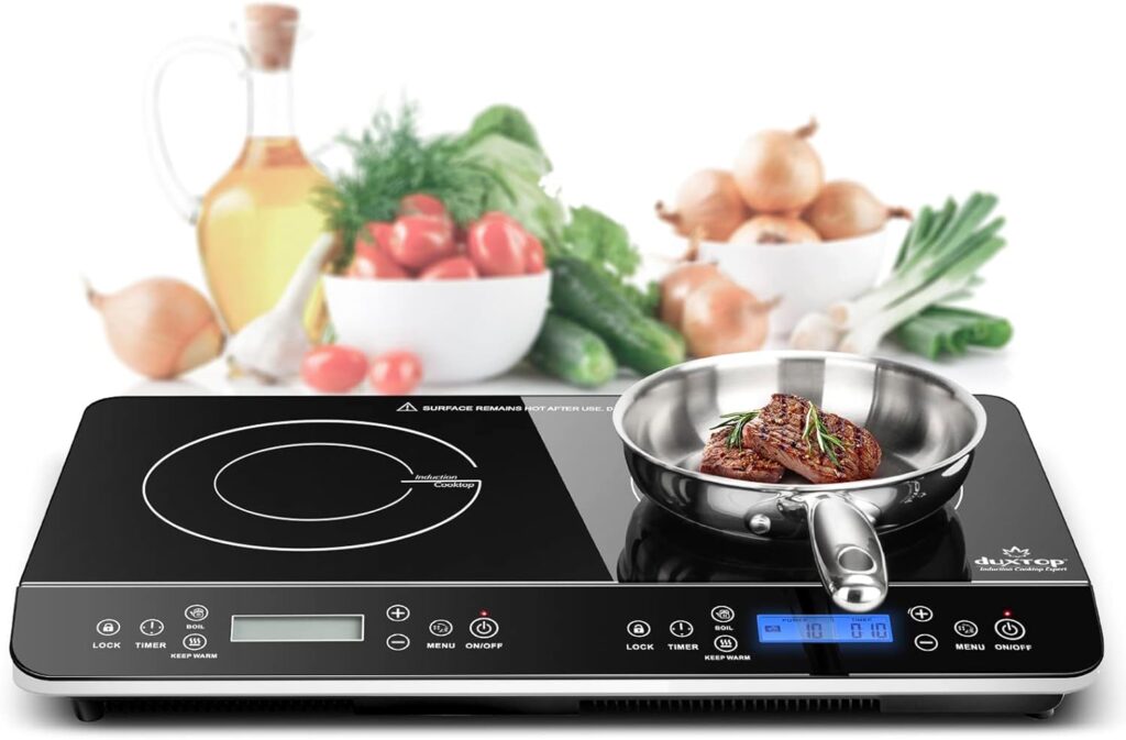 electric stove with veggies and wine around it